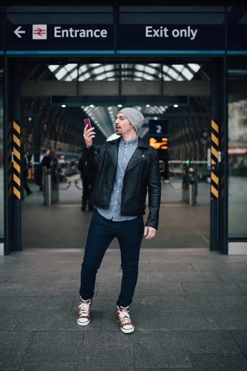man-outside-train-station.jpg