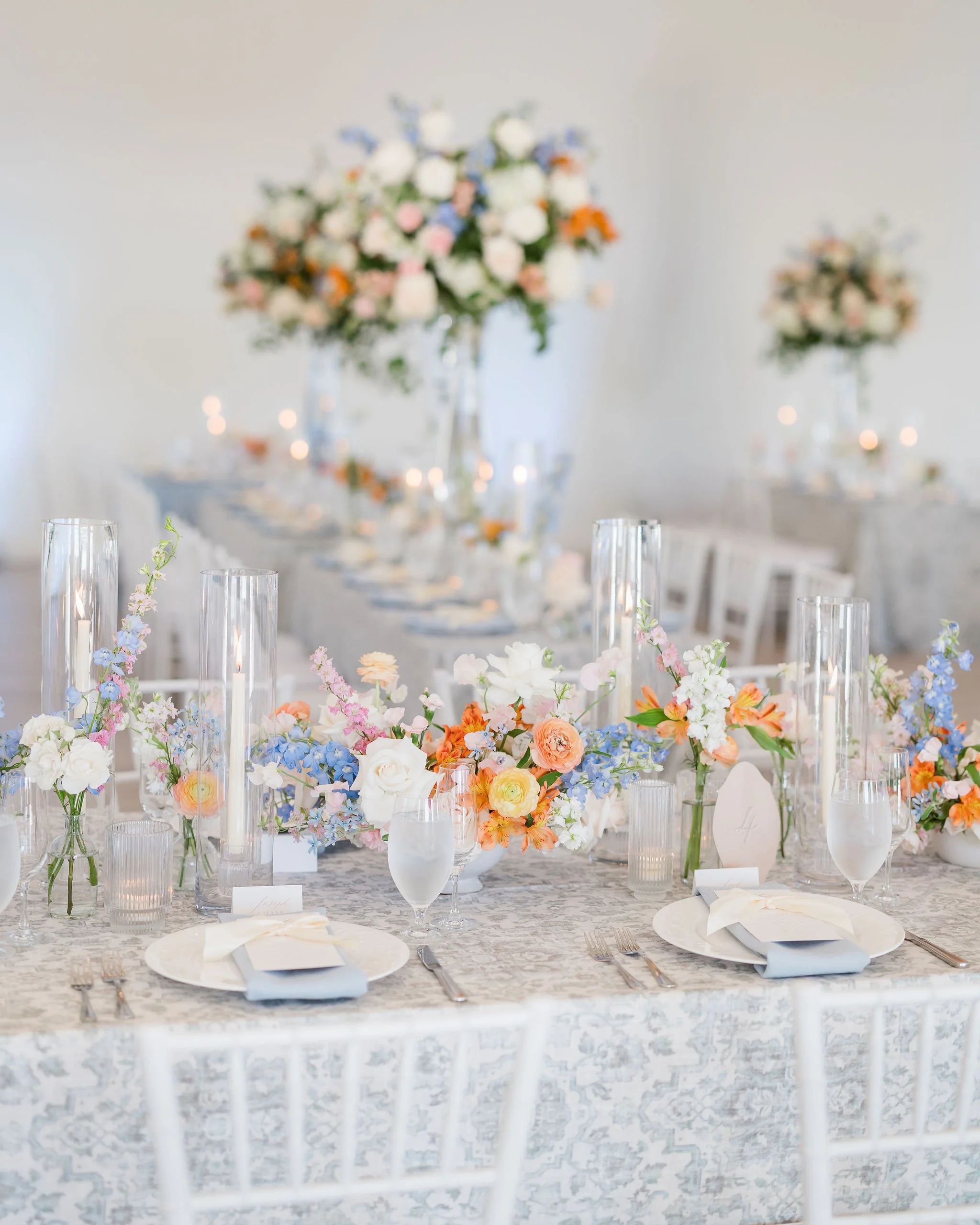 Soft romantic wedding centerpieces by an Austin floral designer.jpeg