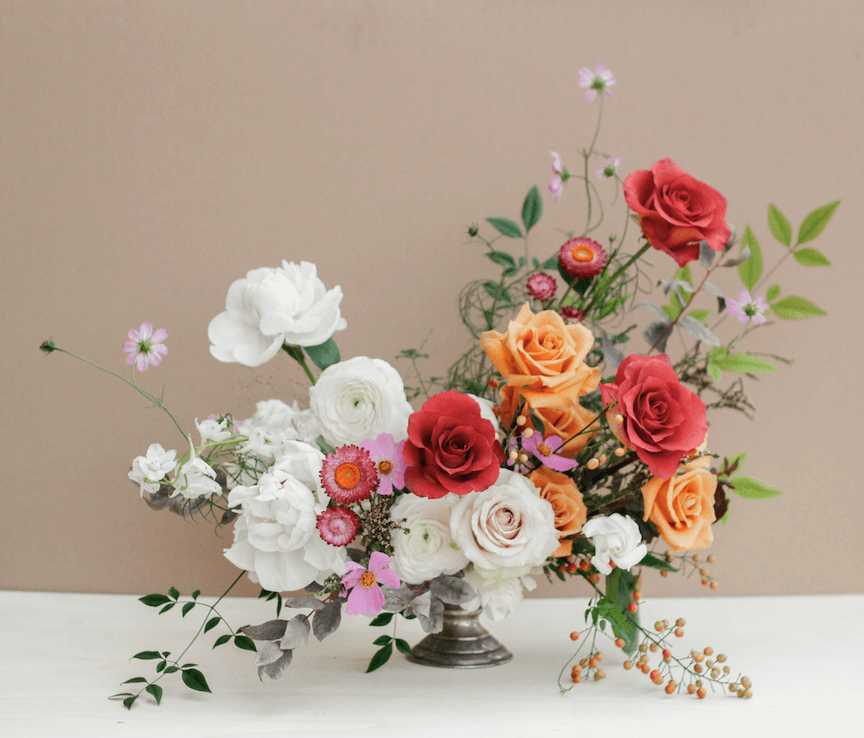 Romantic wedding flowers arranged in a natural, refined style.png.webp