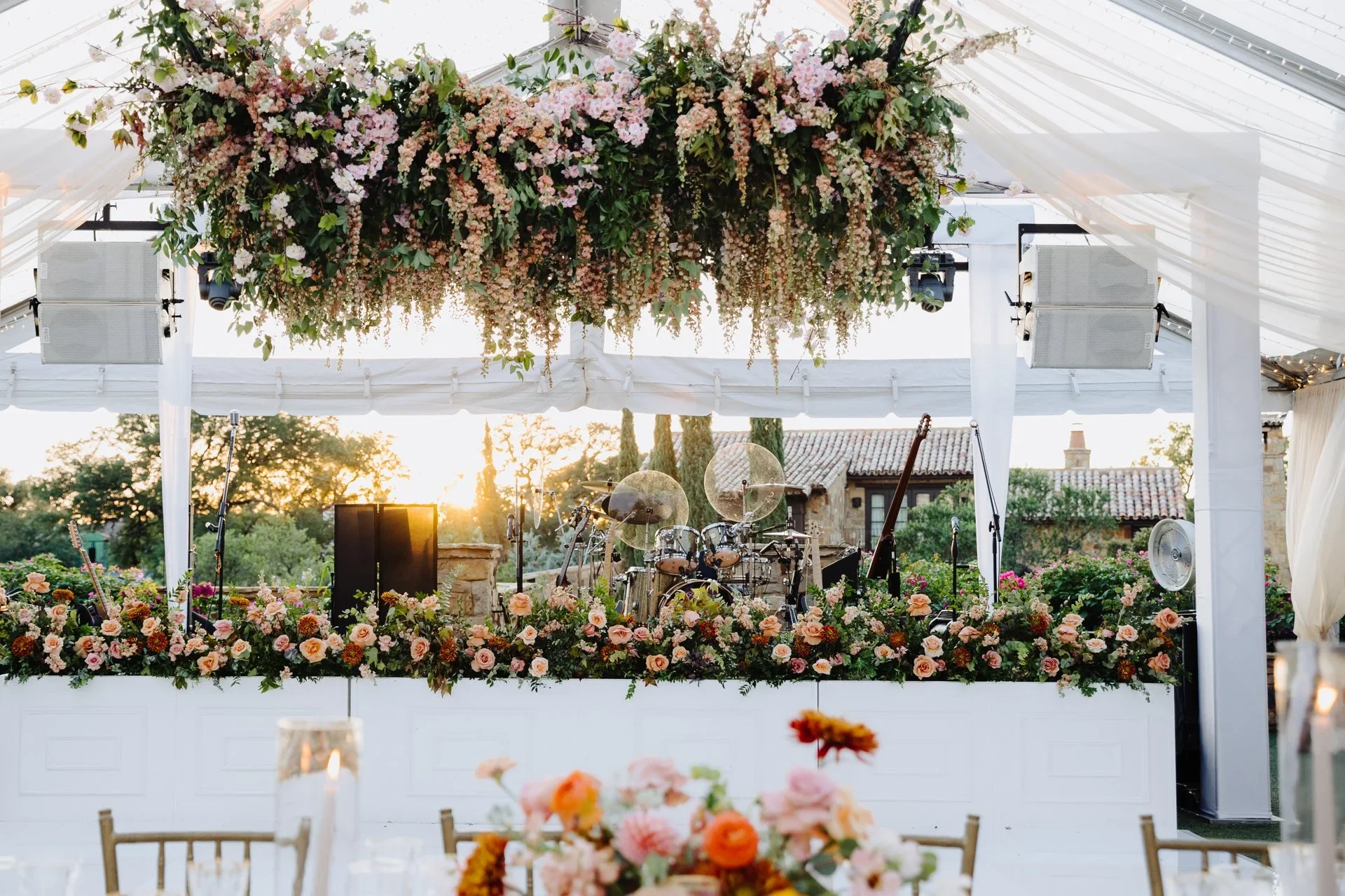 Romantic wedding centerpieces and suspended floral design styled by an Austin wedding florist.jpeg.webp