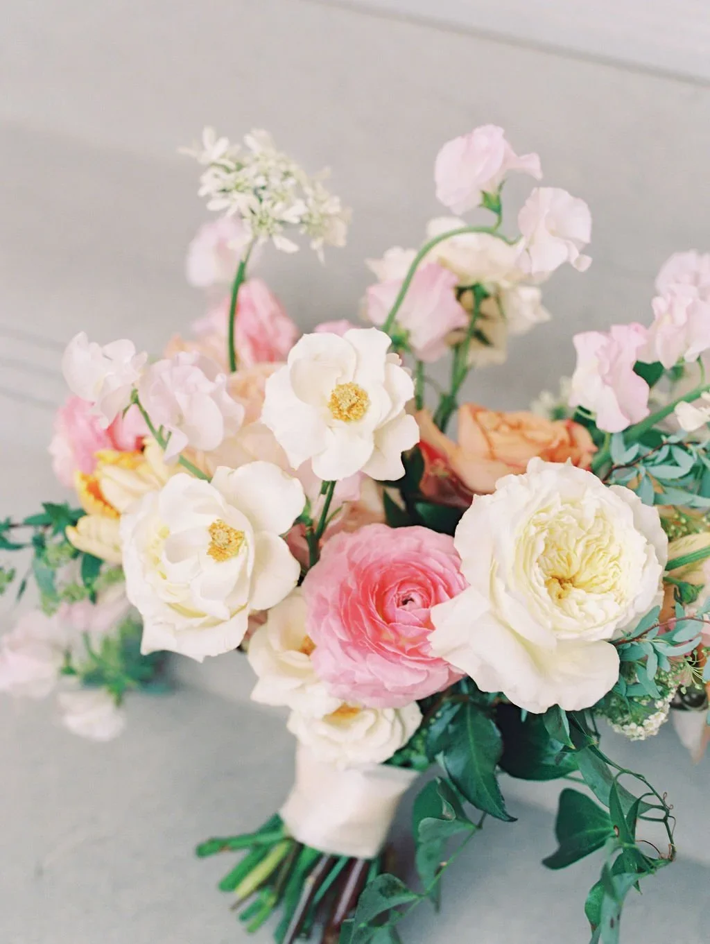 Romantic wedding bouquet with airy, layered textures.jpg.webp