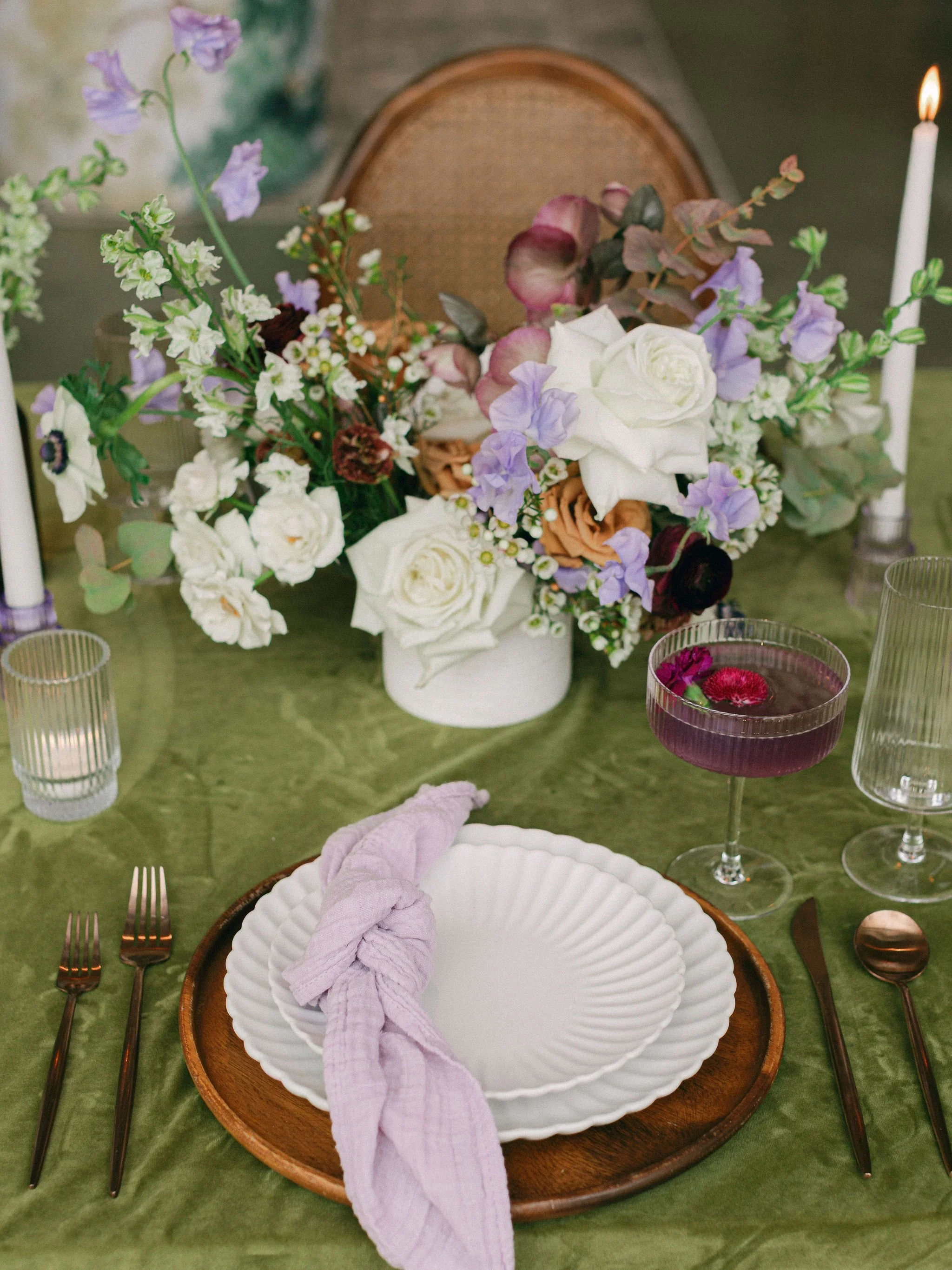 Romantic tablescape florals with soft textures and depth.jpeg