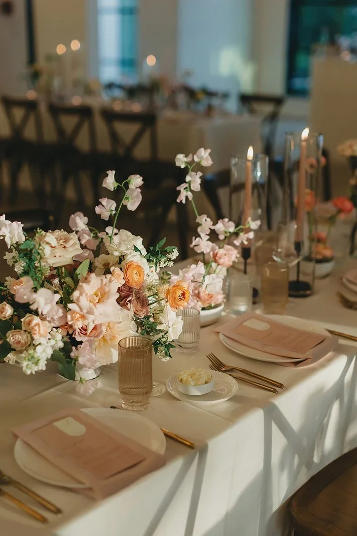 Romantic garden-style centerpiece by an Austin floral designer.jpeg.webp