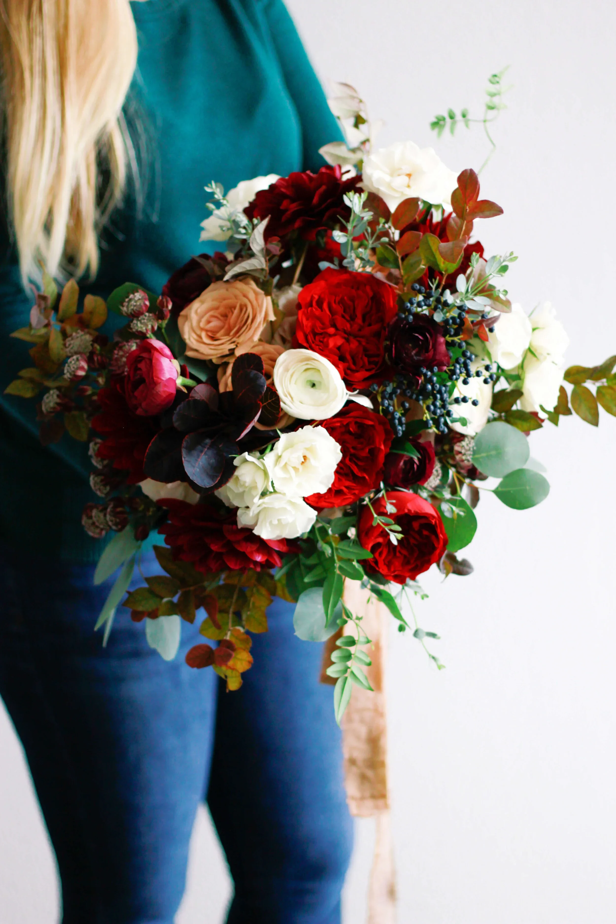 Fine-art romantic bouquet with soft textures and jewel tones.jpg.webp