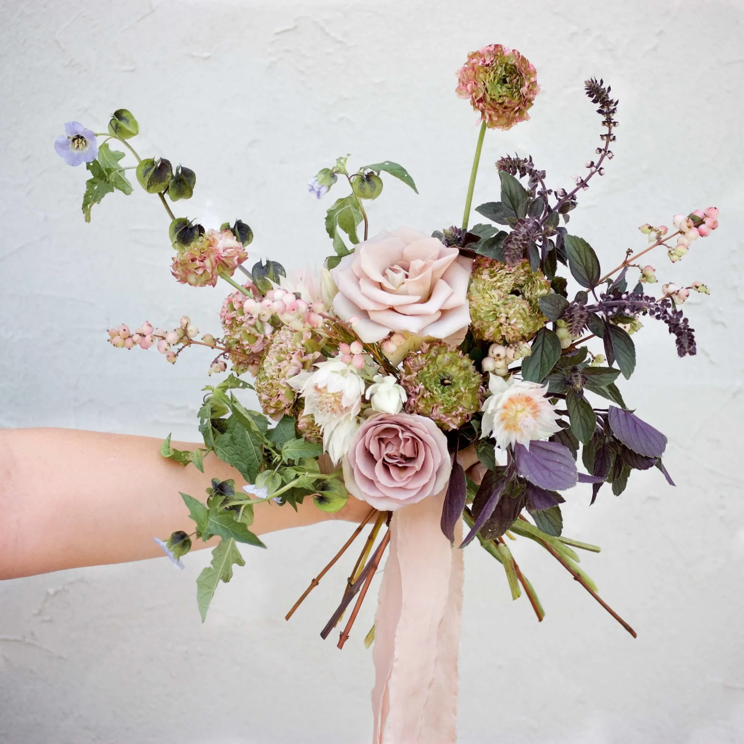 Elegant romantic bouquet with organic, natural styling.jpg.webp