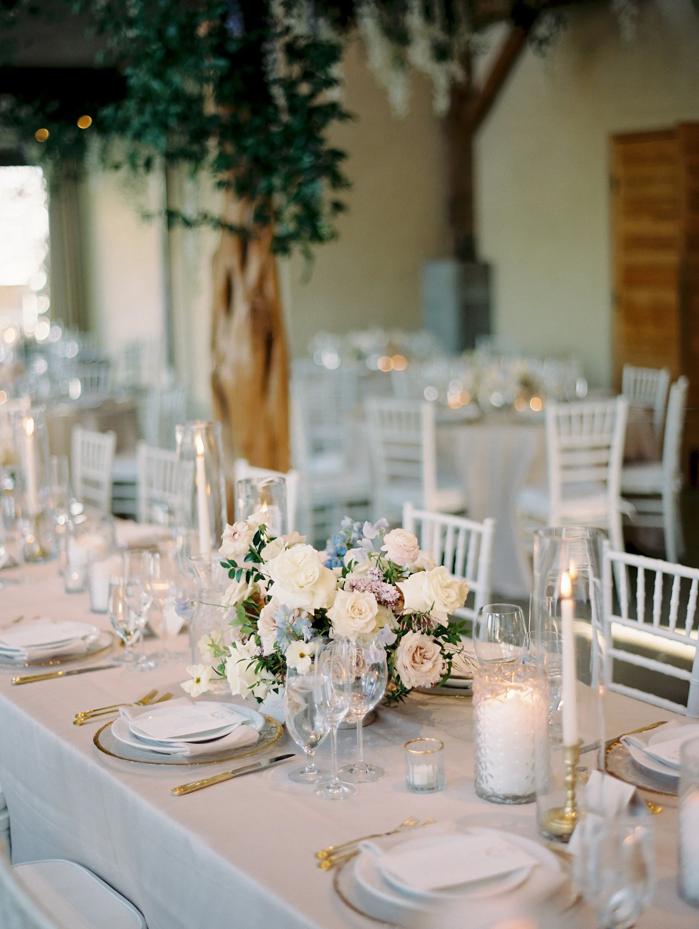 Classic reception flowers with crisp white, lavender and blue blooms.jpg.webp