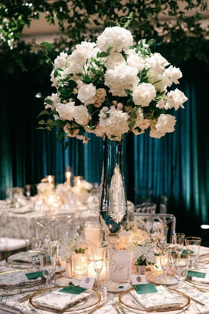 Classic white centerpiece from an Austin luxury floral studio.jpeg.webp