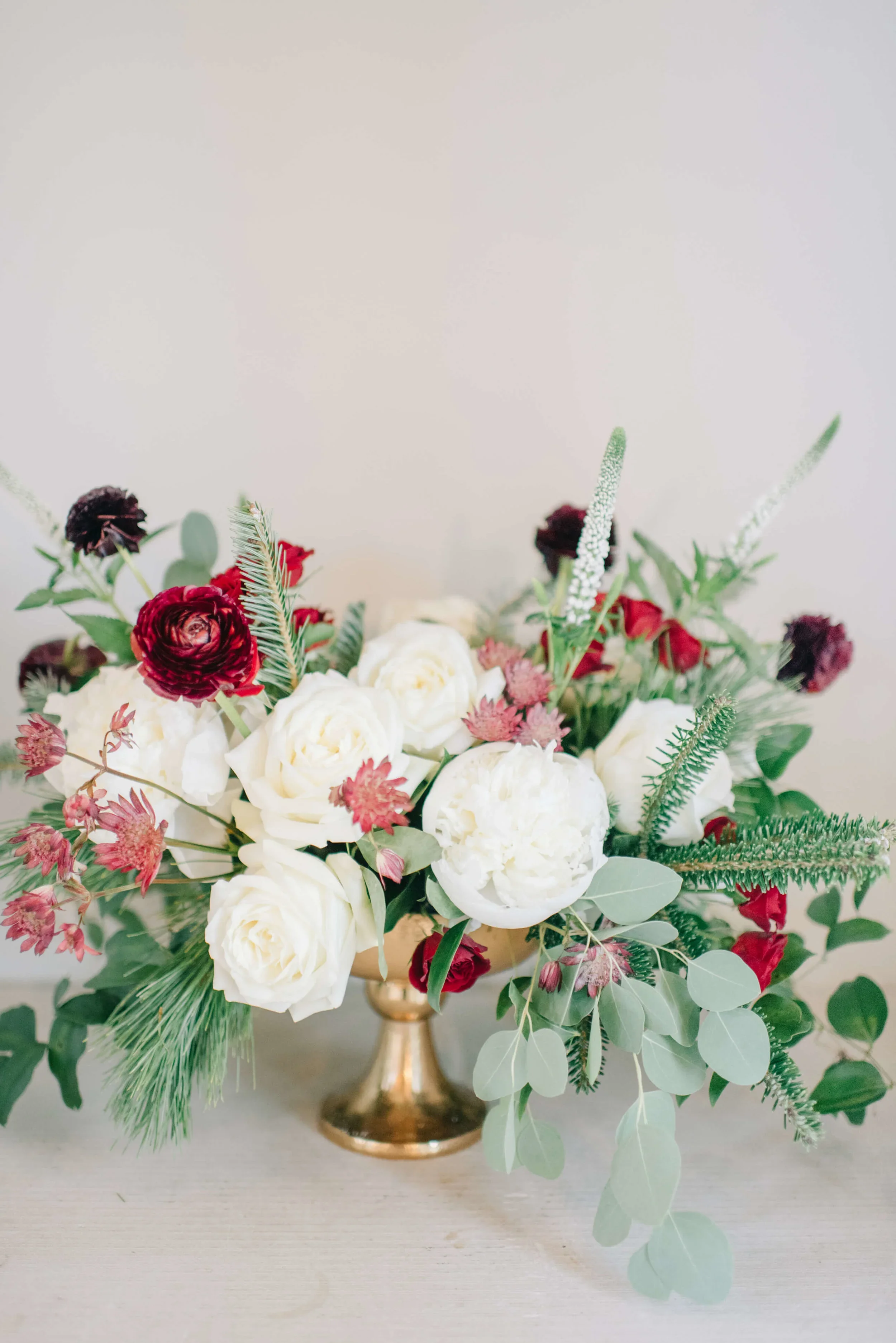 Classic winter wedding centerpiece with polished styling.jpg.webp