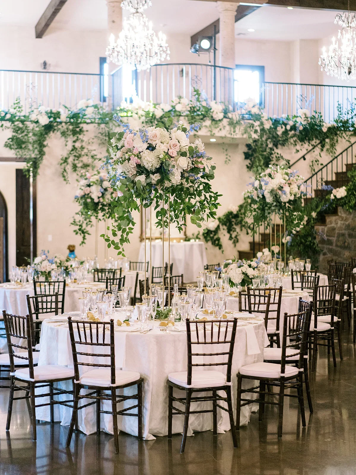 Elegant reception flowers designed in a timeless style.jpg.webp