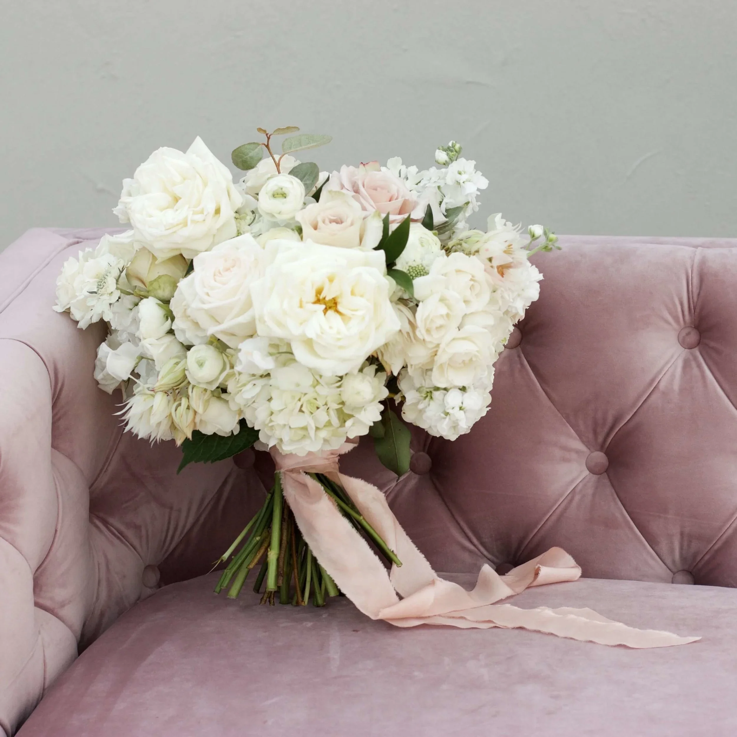 Refined bridal bouquet by a luxury florist in Austin.jpg.webp