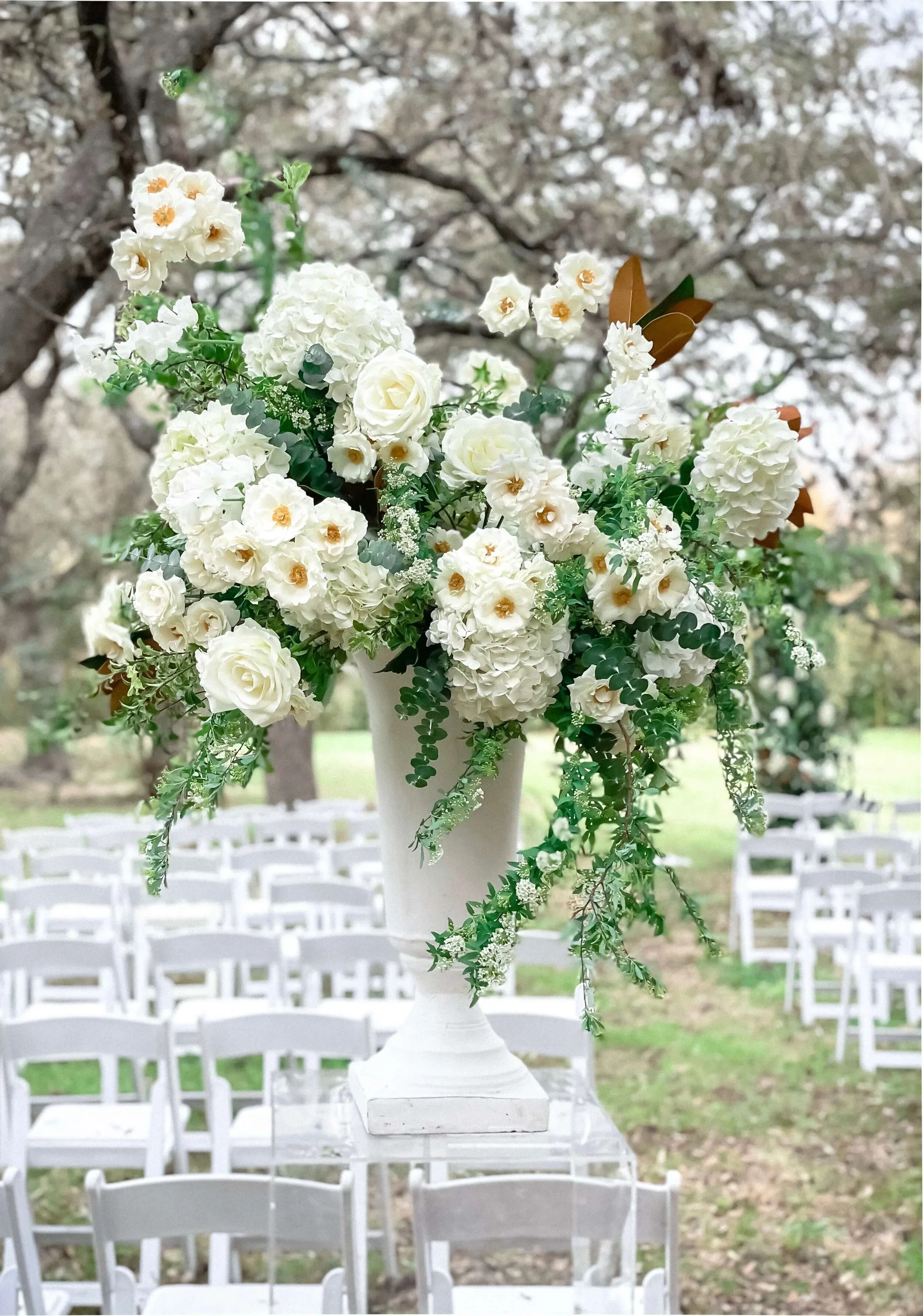 Refined ceremony florals by an Austin-based florist.jpg.webp