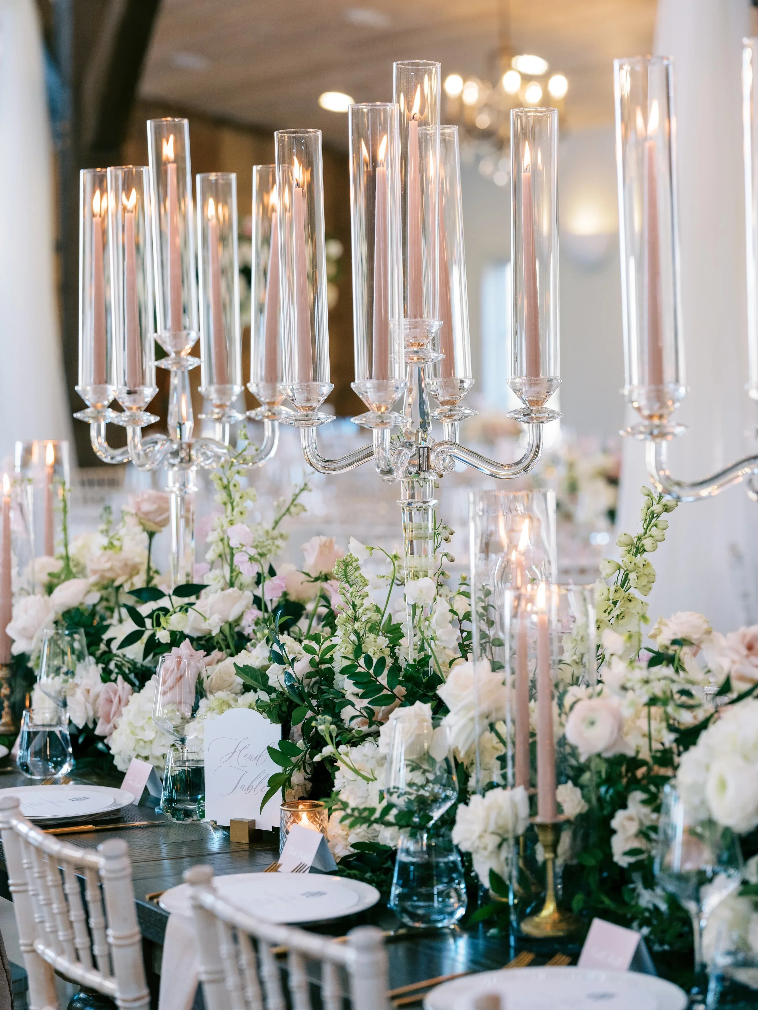 Refined floral and candelabra styling with classic proportions.jpeg.webp