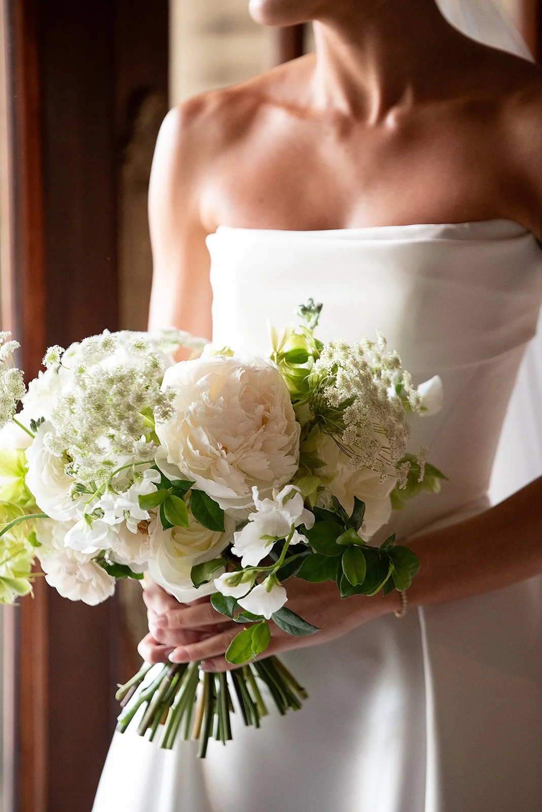 Refined green and white bridal bouquet with classic proportions.jpeg