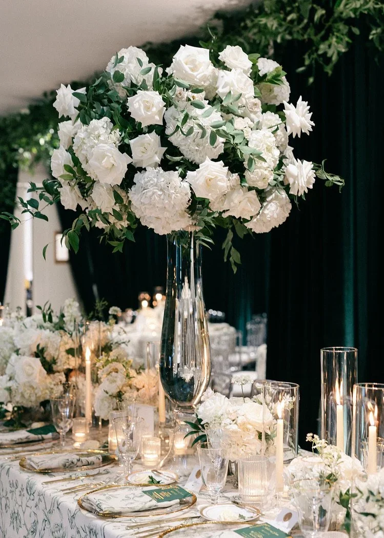 Traditional floral tall centerpiece design with refined details.jpeg.webp