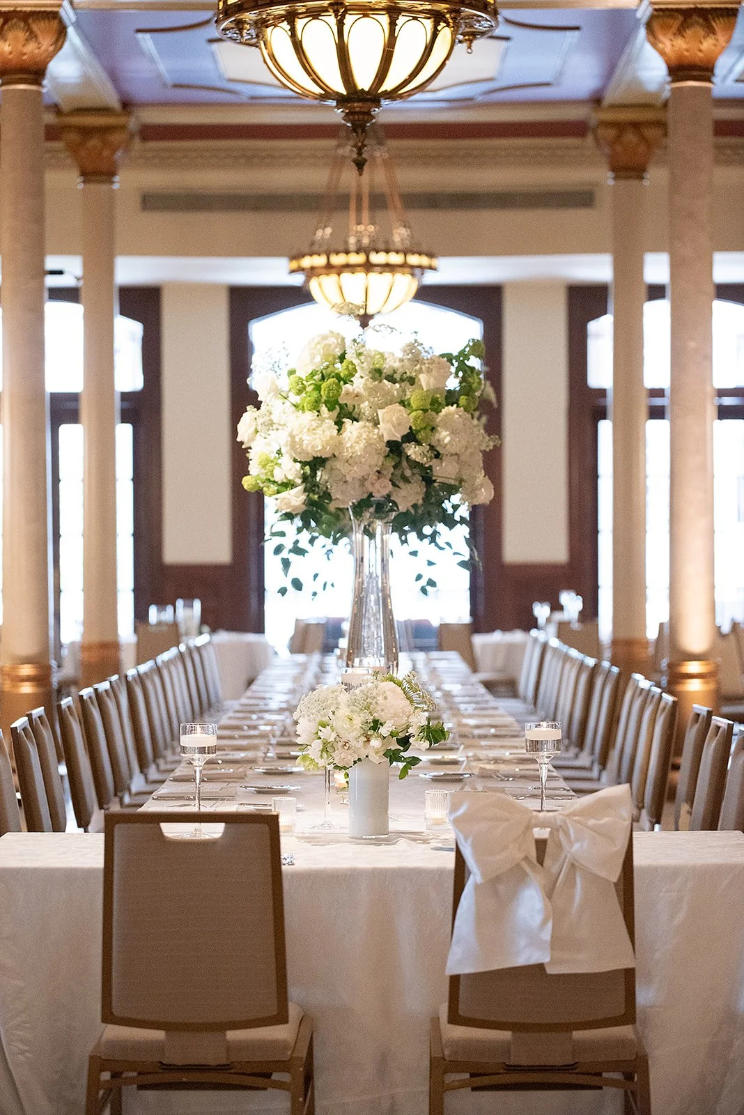 White and green wedding centerpiece with tailored look.jpeg