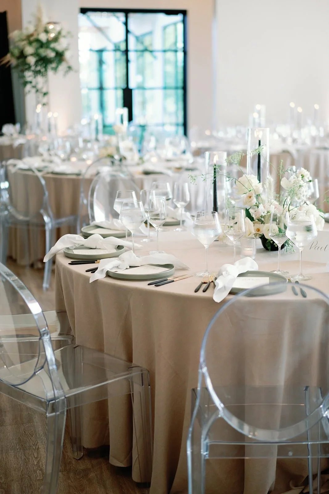 Garden-style romantic centerpiece with black and white accents.jpeg.webp