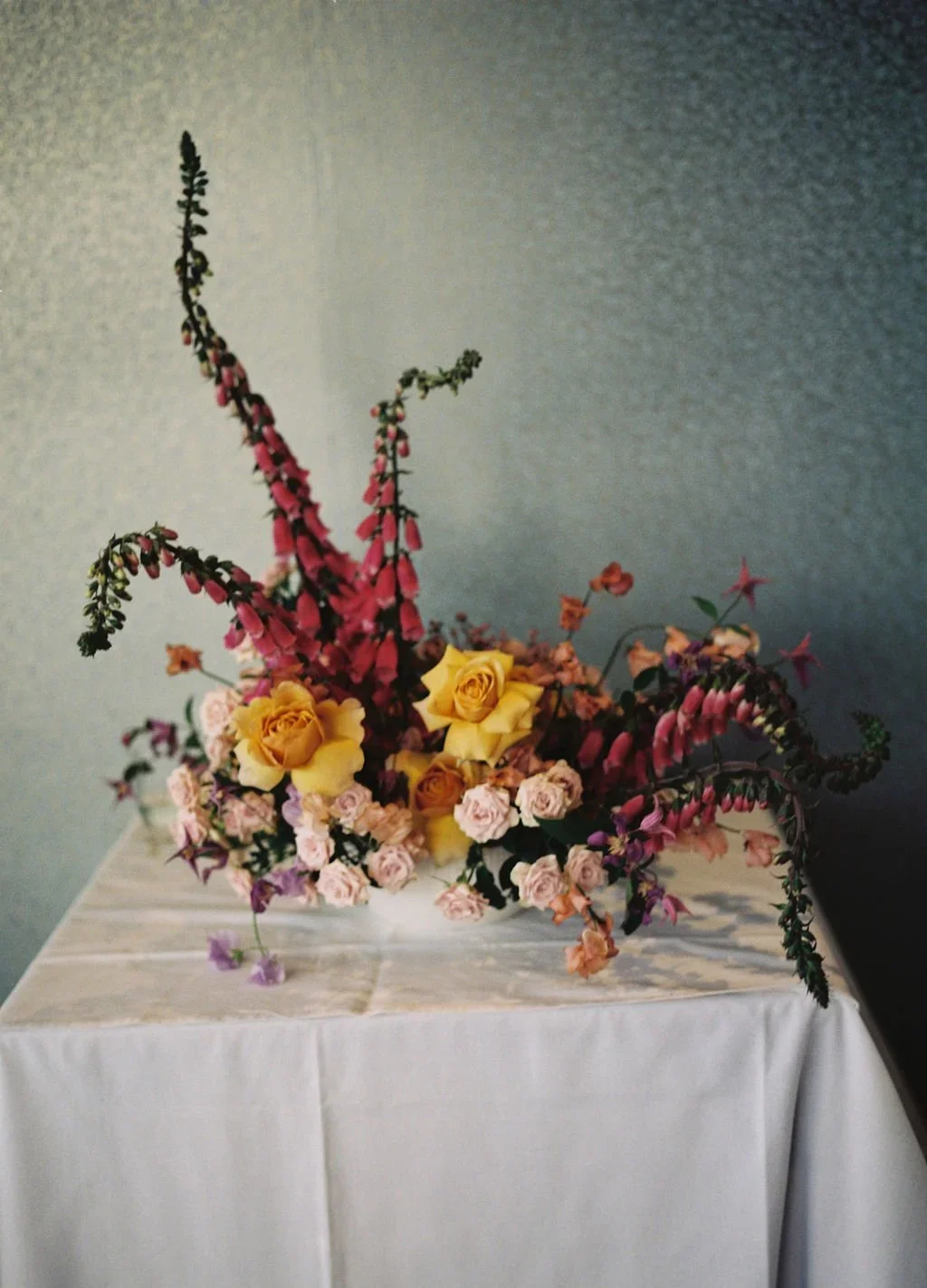 Editorial centerpiece with sculptural shape and natural movement.webp