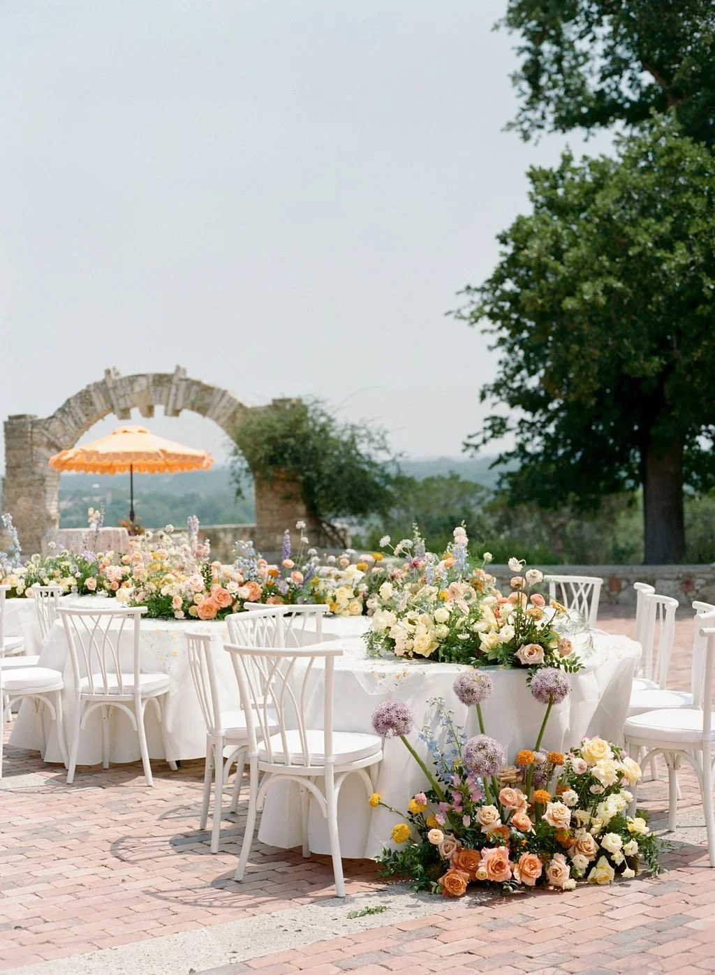 Editorial floral installation with dramatic shape and movement.webp