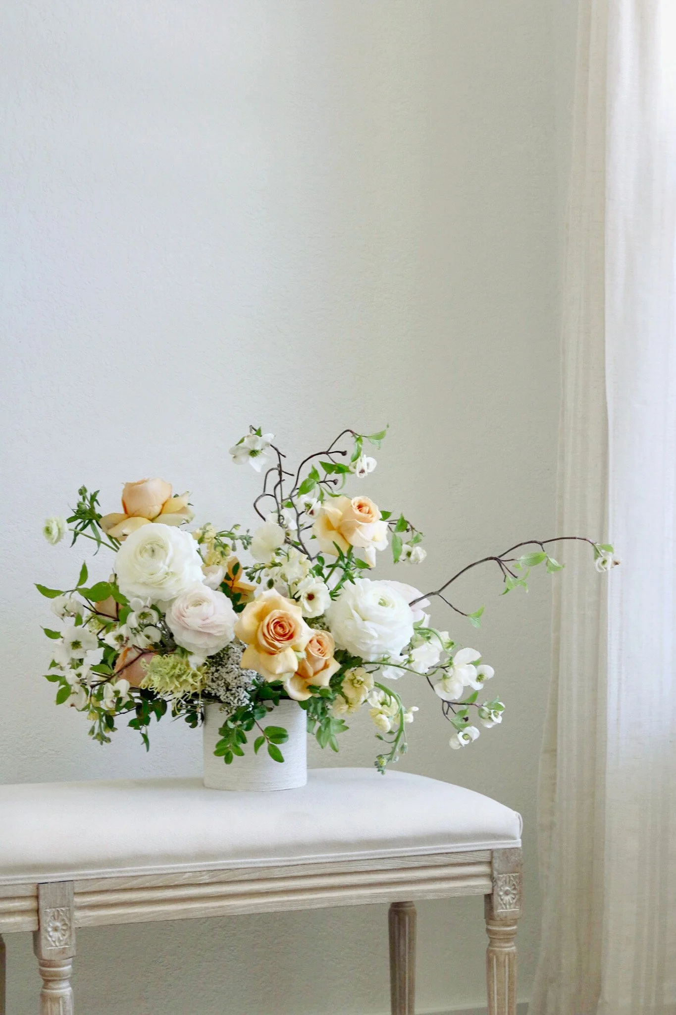 Seasonal floral arrangement handcrafted by Stems Floral Design