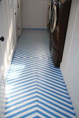 http://www.lovestitched.com/my-tutorial/how-to-paint-tile-floors-a-tutorial/