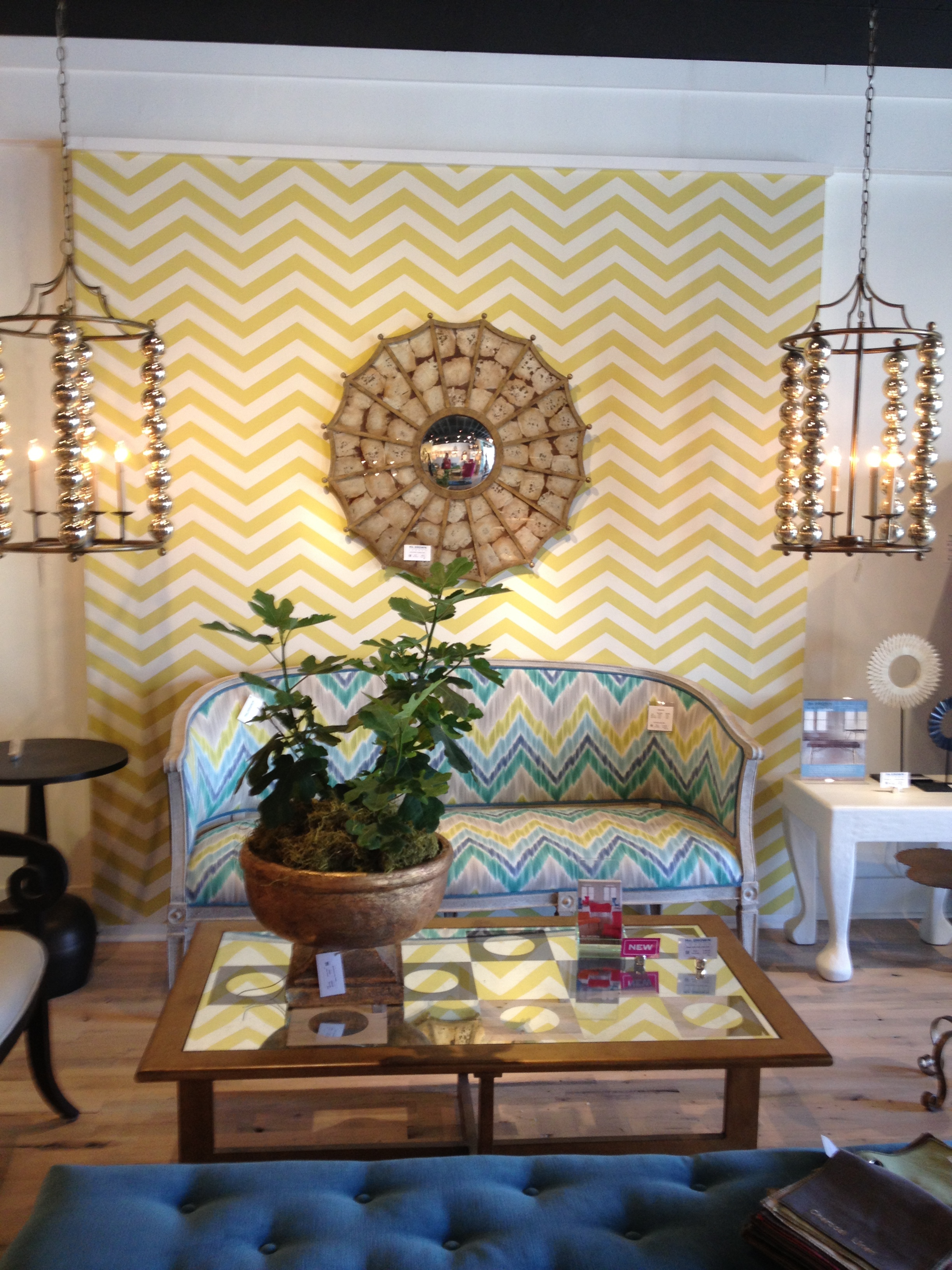 Bold wallpaper and fun light fixtures.