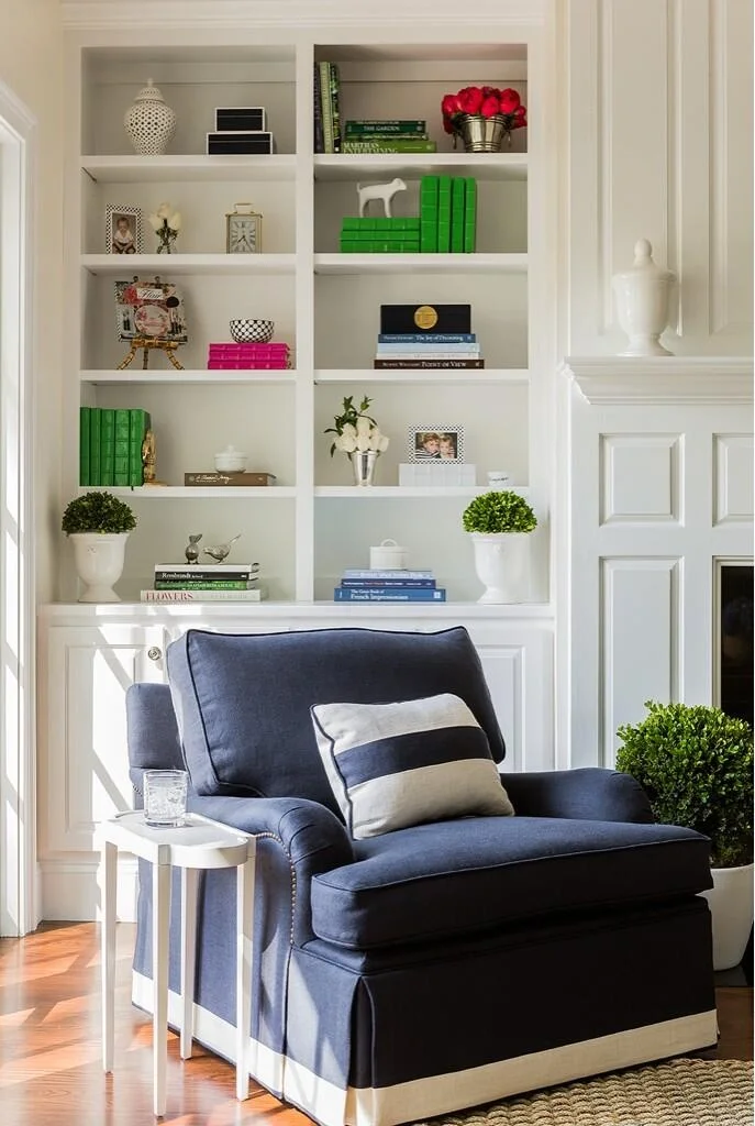 Found on oomphonline.com . The Oomph side table is too cute. I also love the banding on the chair. I did a very similar design on my newest purchase. The kelly green accessories have a big impact. 