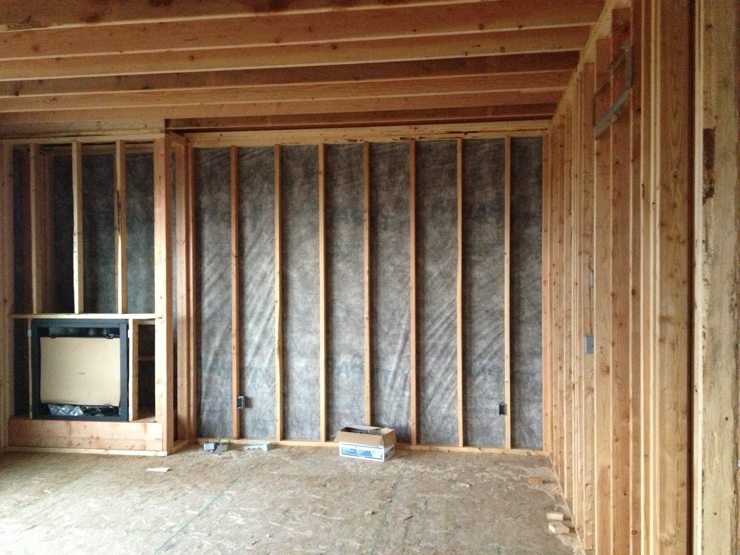 I wanted the fireplace off center. It allowed for one long wall of cabinetry to be run beside it and it's something a little differrent.