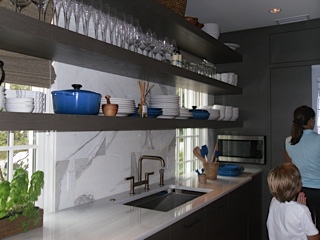 Open shelving with pops of blue accents.