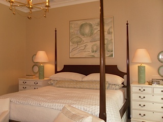 Master Bedroom with a neutral color scheme hinted with light green.