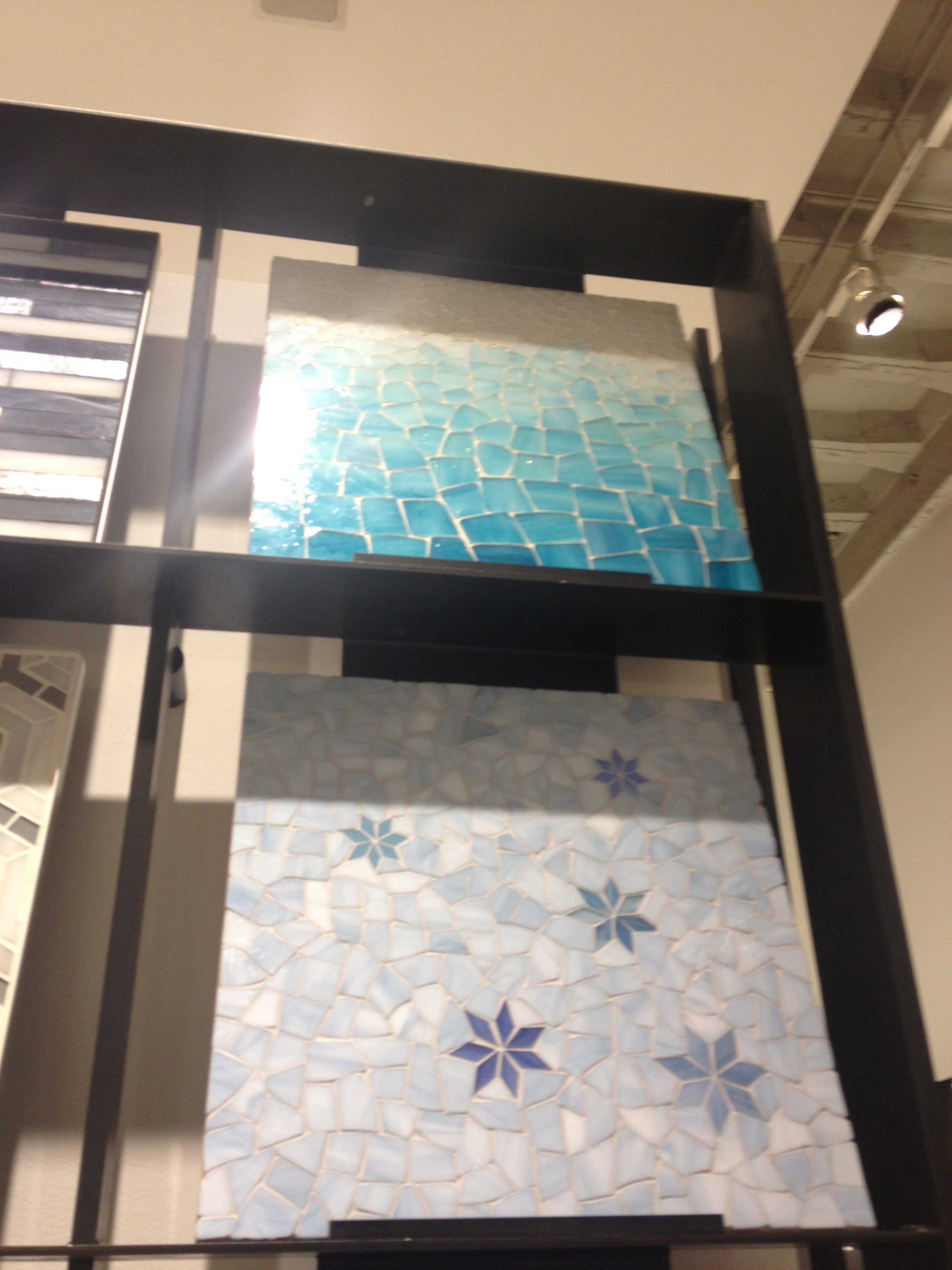 The ombre glass mosaic on tile is really unique. www.saranobledesigns.com