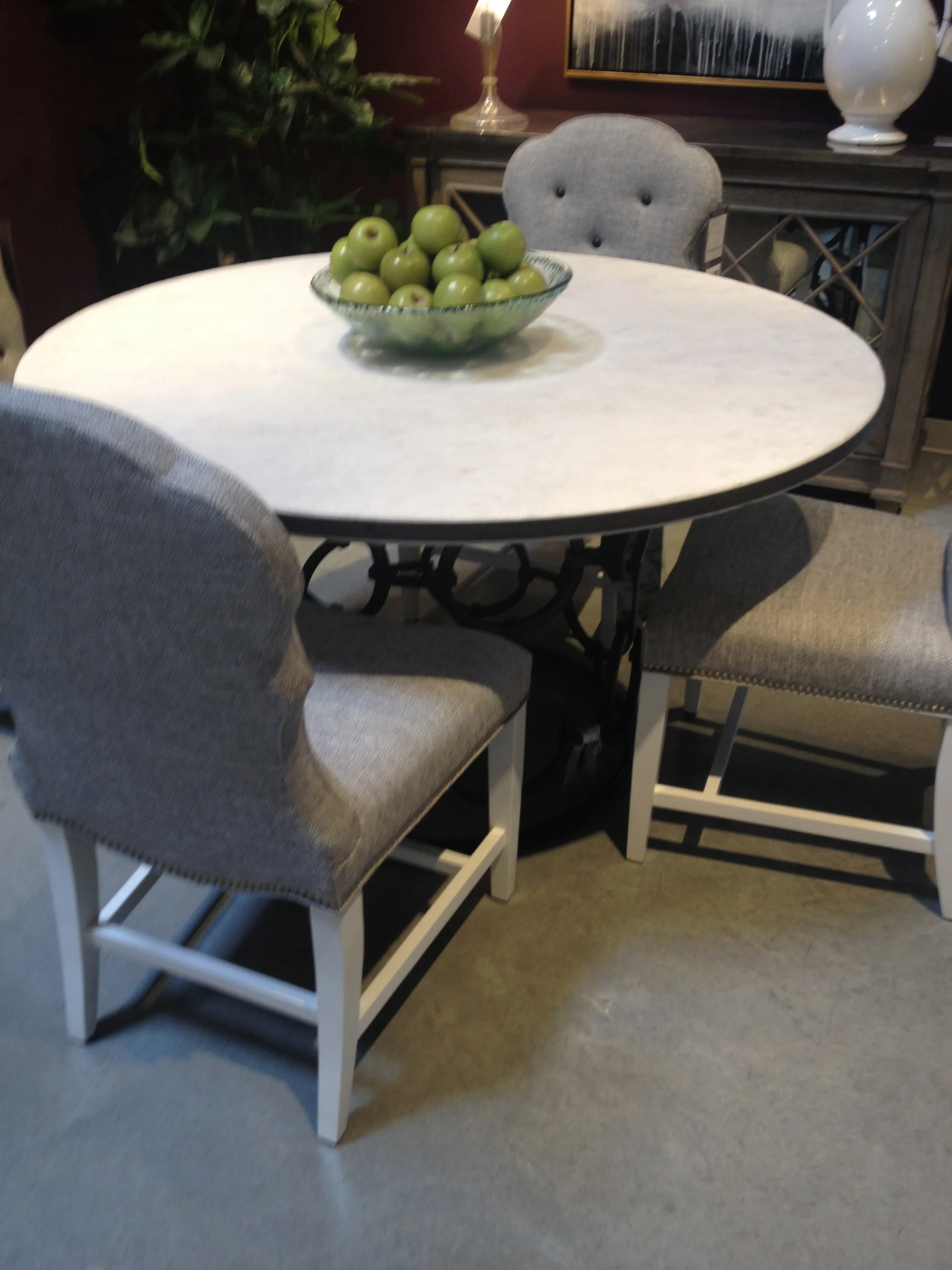 KDR displays this dining room table with an awesome stone tabletop.