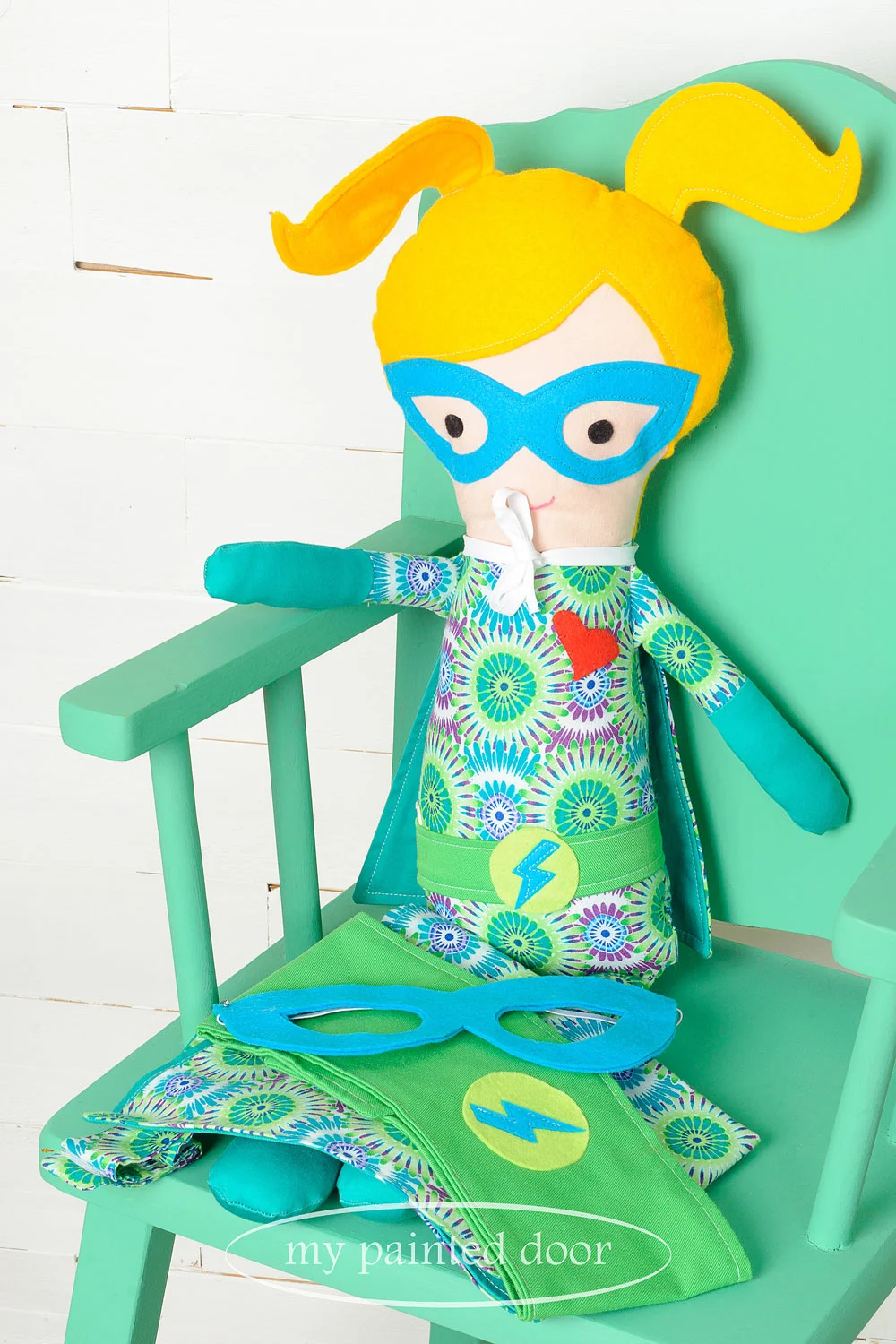 Chair painted in Fusion Mineral Paint in the colour Ceramic and superhero doll by Sew Whimsical by Katie - via My Painted Door (.com)