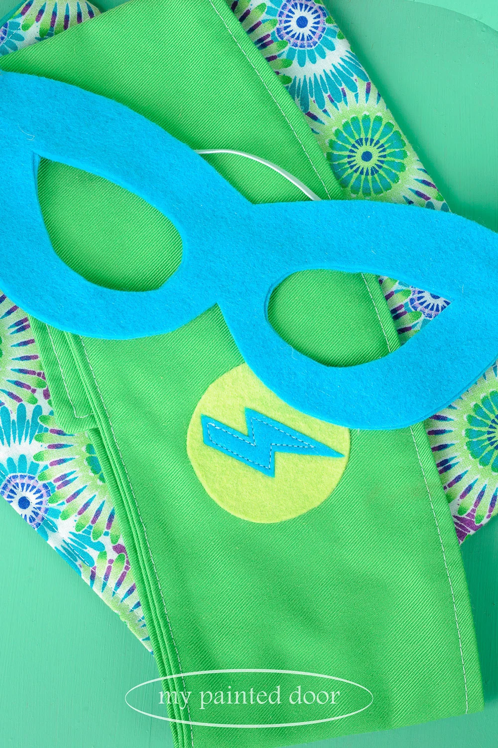 Child size superhero cape, belt and mask by Sew Whimsical by Katie - via My Painted Door (.com)
