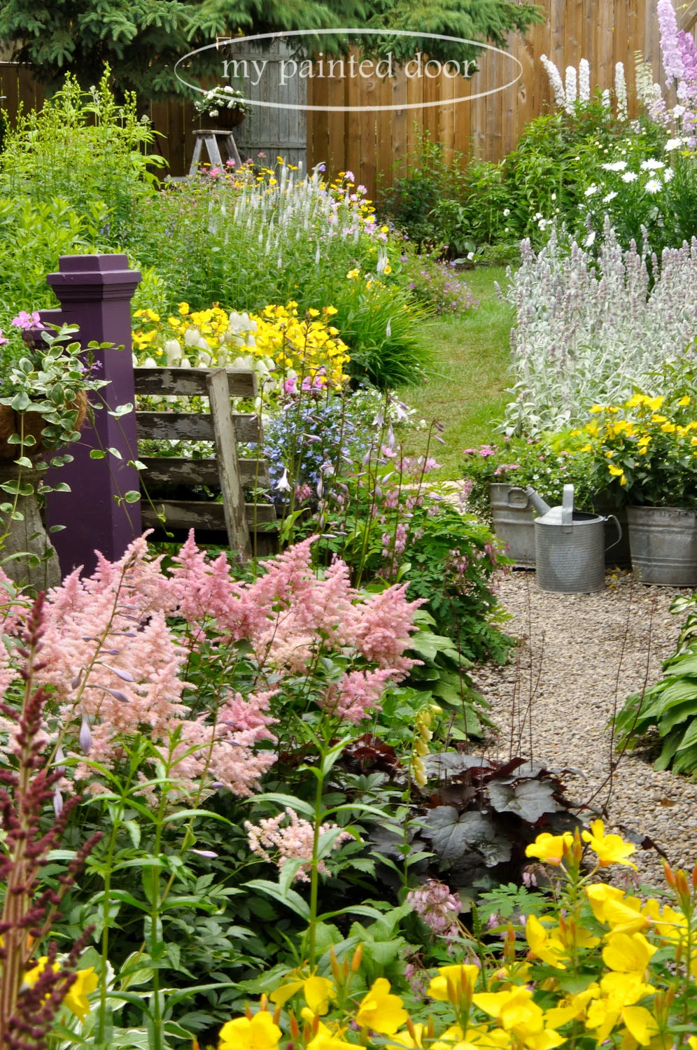 My Country Garden - Sue Sikorski's zone 3 garden - newel posts in the garden.