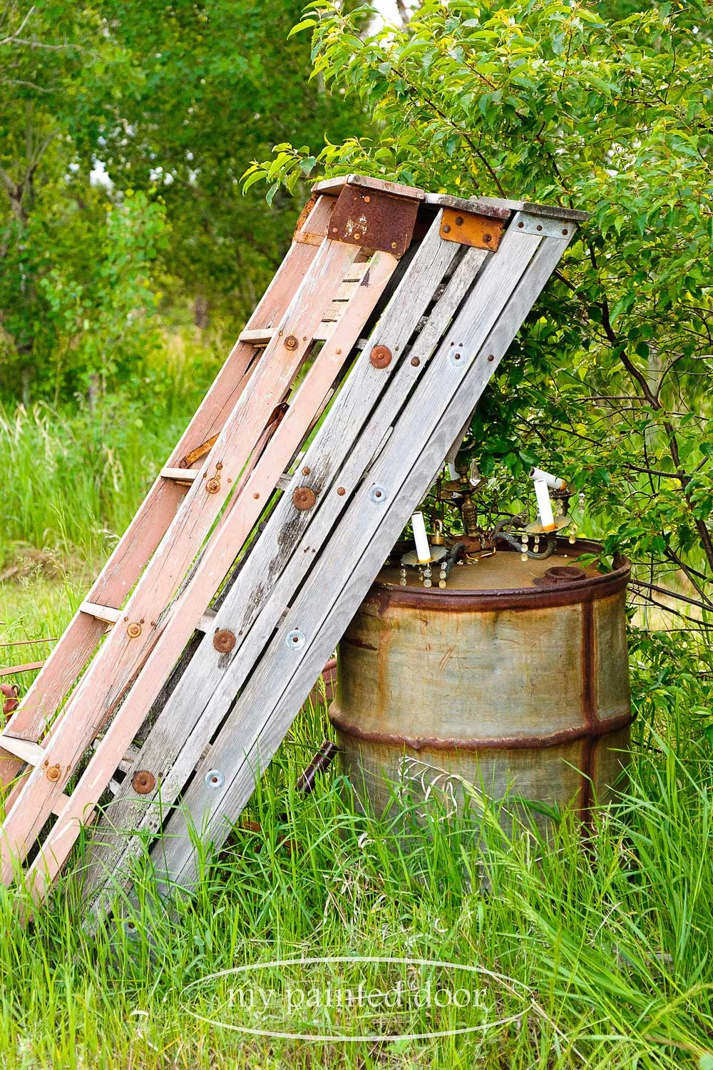 collection of old ladders waiting to find a place in my garden
