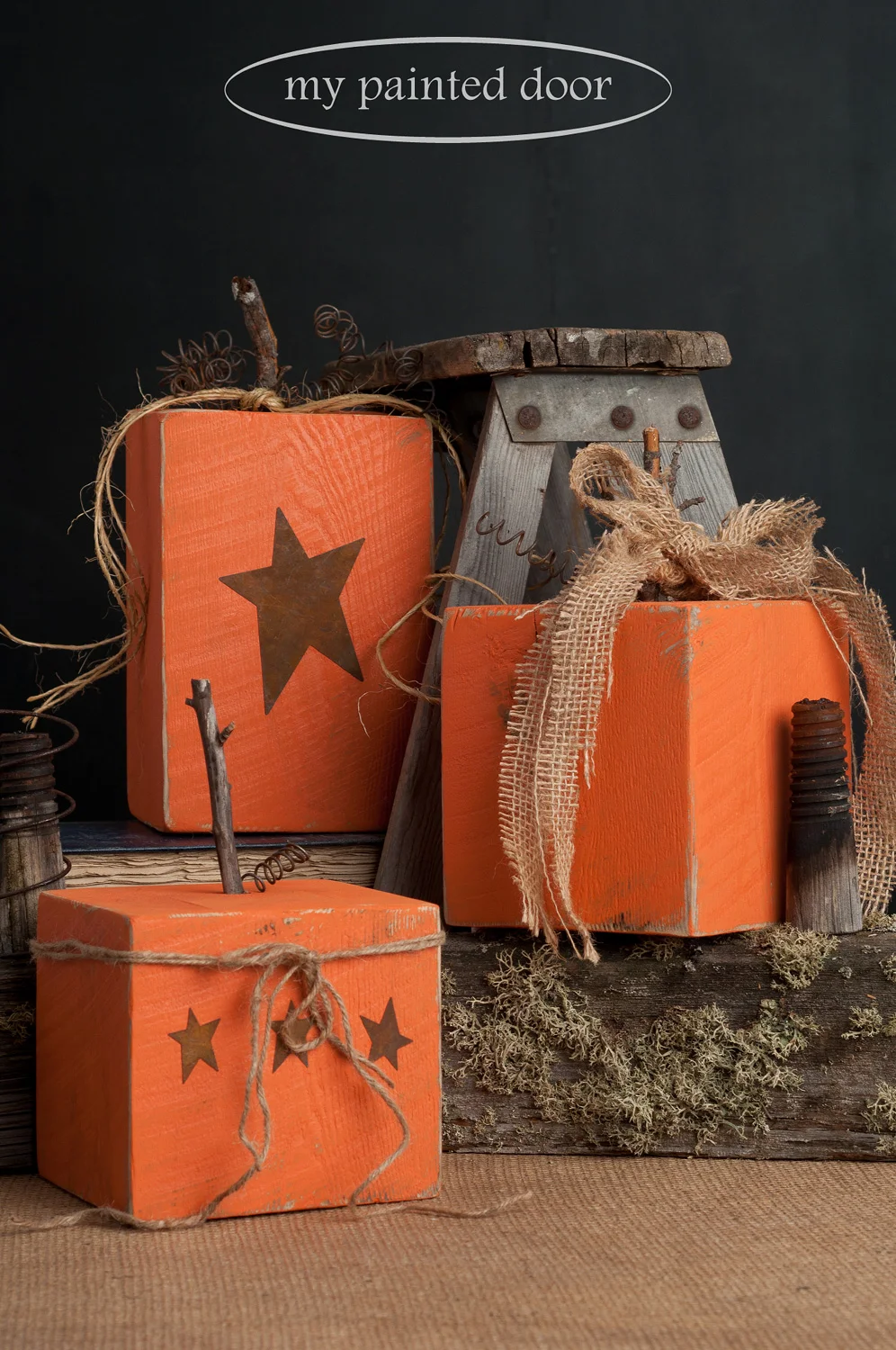 Rustic wood pumpkins painted in Tuscan Orange Fusion Mineral Paint