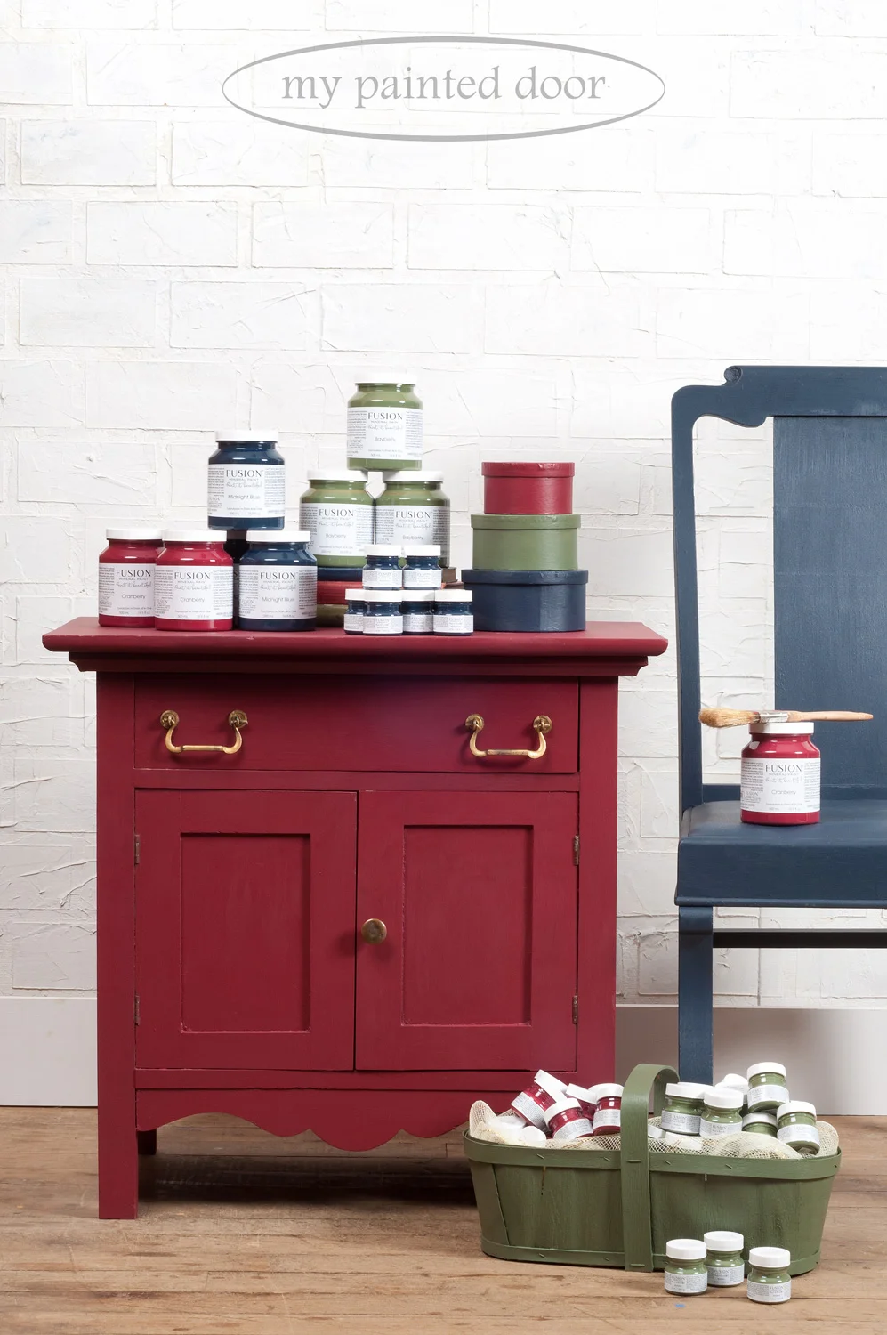Washstand painted in Cranberry Fusion Mineral Paint. Chair painted in Midnight Blue and wood basket painted in Bayberry.