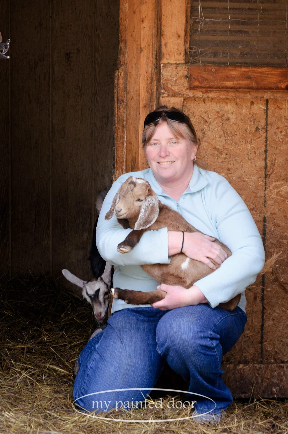 Kirsten Spence from Hurkett Hill Farm and a couple of her baby goats