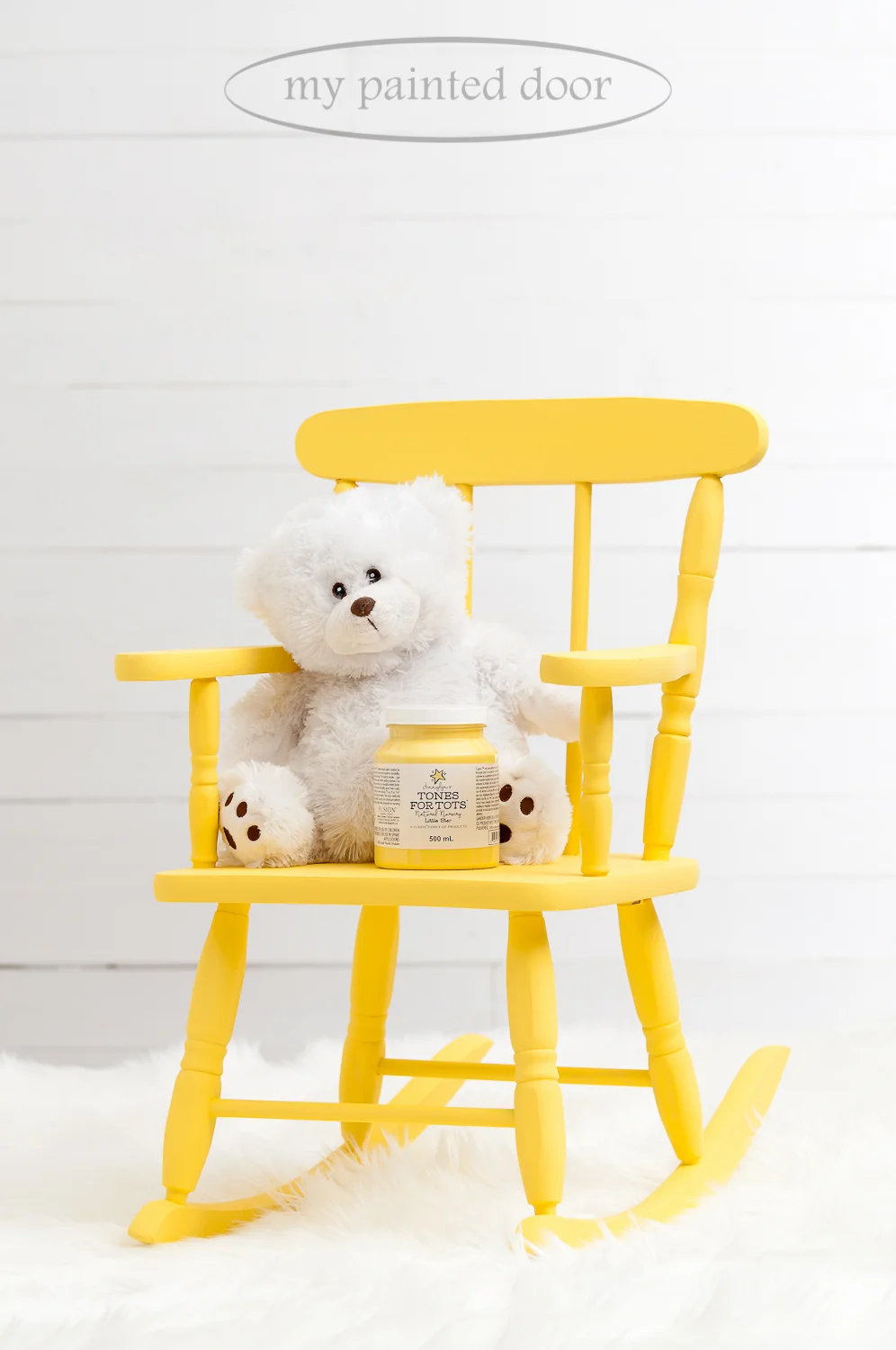 Child's rocking chair painted in the Tones for Tots line of Fusion Mineral Paint. The colour is Little Star.