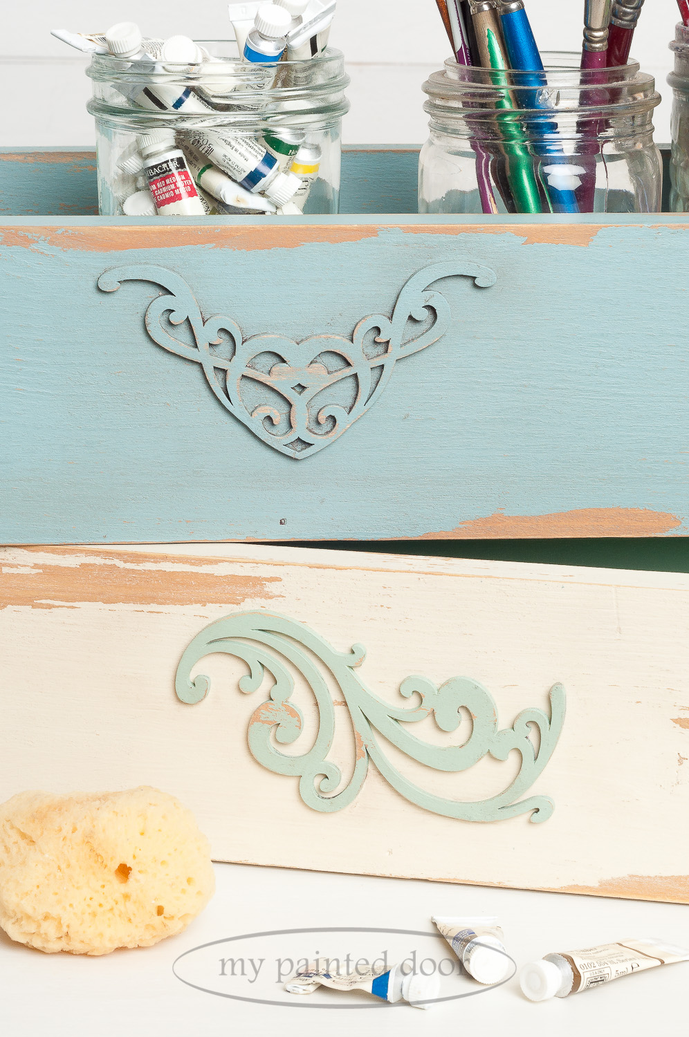 Wood boxes painted in Fusion Mineral Paint in the colours Heirloom, Plaster and Brook. Heavy distressing achieved by using Homestead House Salad Bowl Finish as a resist.