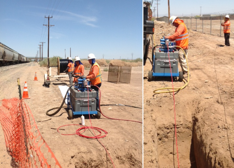 Under the hot desert sun, HP Crew is using a Condux Fiber Optic Cable Blower to blow microfiber into Duraline's 10/8 microduct.