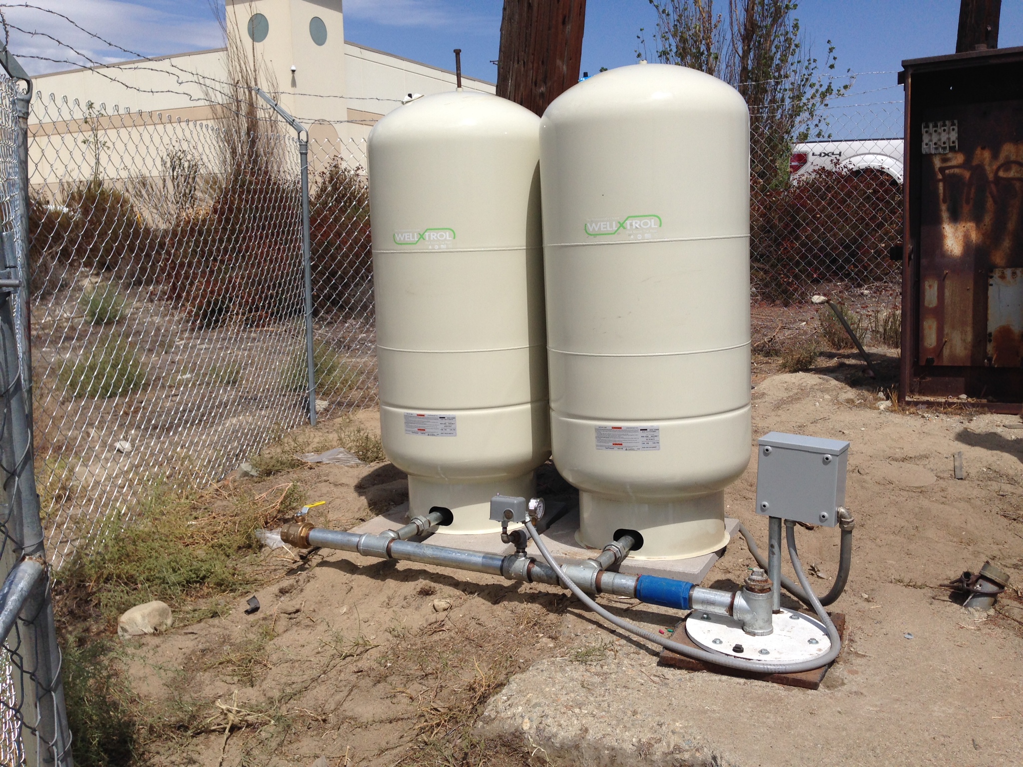 Getting the well pump station in place.