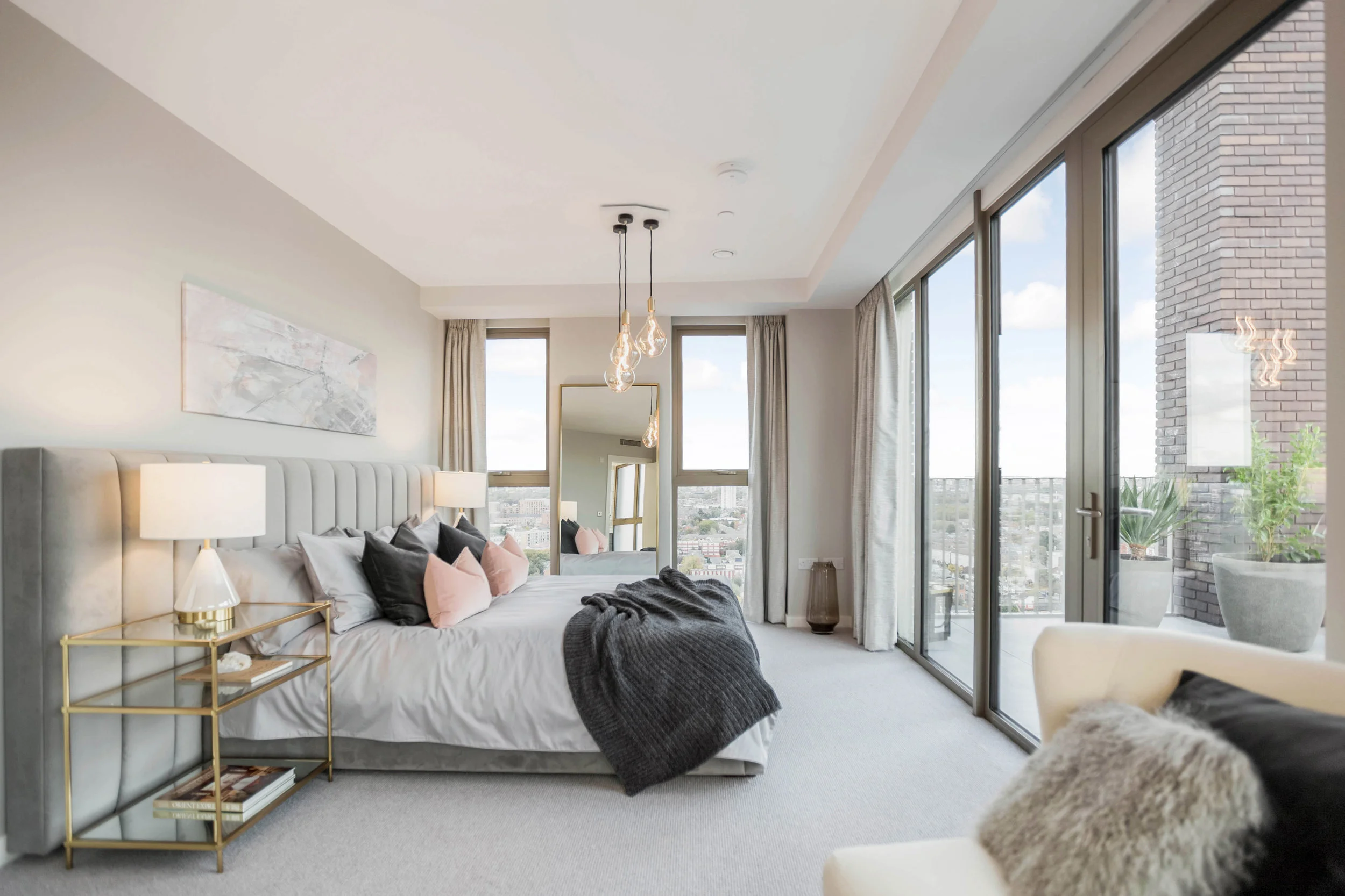  Our design for the master bedroom in&nbsp;Mount Anvil’s penthouse apartment has a concept of ‘Precious Stones’.  This feel is created through the use of a pale colour scheme.  Delicate finishes and details fill the space: marble, brass, mirror and v