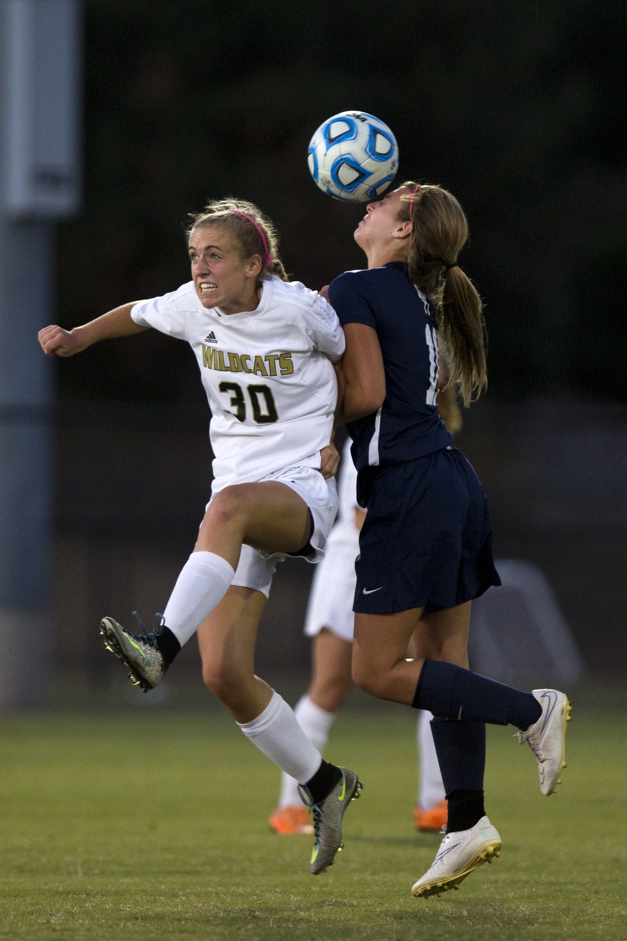  15 Sept. 2015, Jasper, Ind. --&nbsp;Jasper's Anna Charron and Heritage Hills' Paige Priest collide as they jump to head the ball during Tuesday night's game in Jasper. The Jasper Wildcats won 3-1.&nbsp; (Copyright The Herald) 