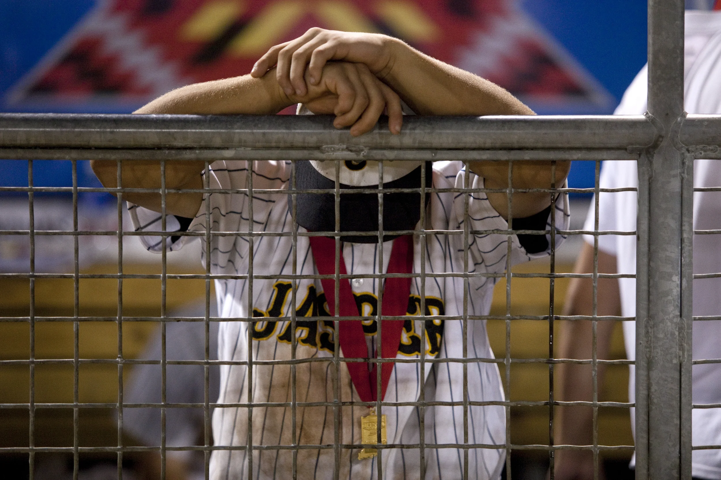  19 June, 2015, Indianapolis, Ind. --&nbsp;Jasper's Tyler Haskins reflects in the dugout after Jasper's 2-1 defeat to Andrean in the Class 3A baseball state championship at Victory Field in Indianapolis. In a game with two rain delays totaling nearly