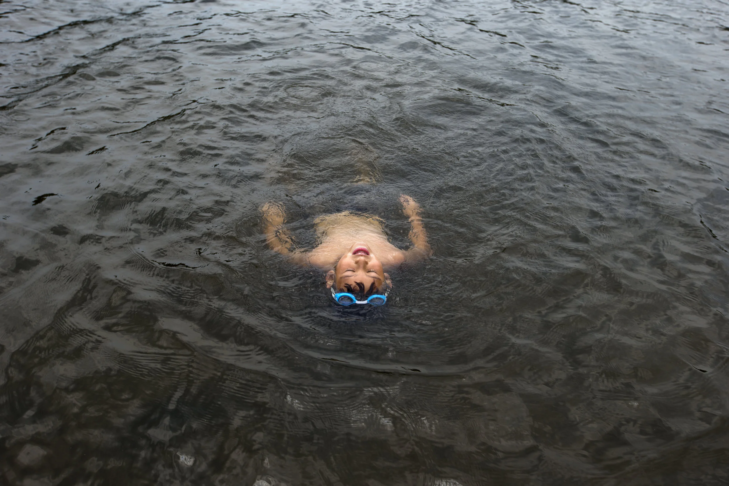  Ya'hirr Fierro of Ferdinand, 6, floated on his back in the water as he played with his grandmother and cousins on June 22, 2016, at Ferdinand State Forest Lake. Fierro's grandmother, Gloria Villarreal of Ferdinand, said she tries to take the grandki