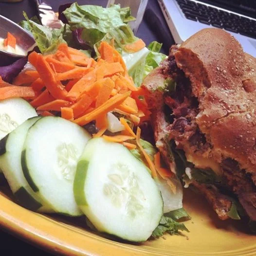Block 15's house made Black Bean Burger with oil-free honey mustard dressing