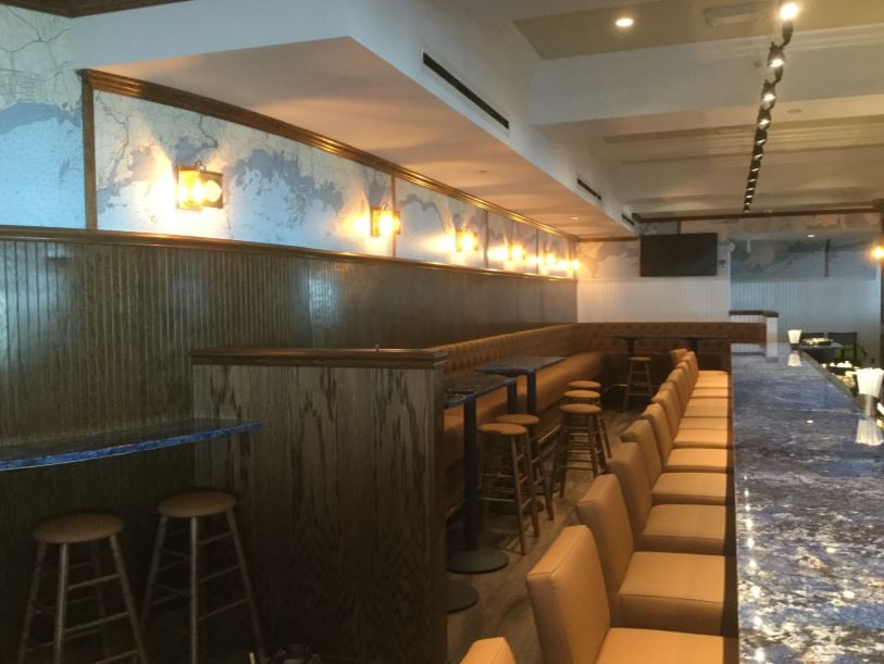 Notice how the colors of the new counter top match the new colors of the nautical chart wallpaper! Our wallpaper can be created so that the new colors of the nautical chart tie in with the other and various colors in a room. 