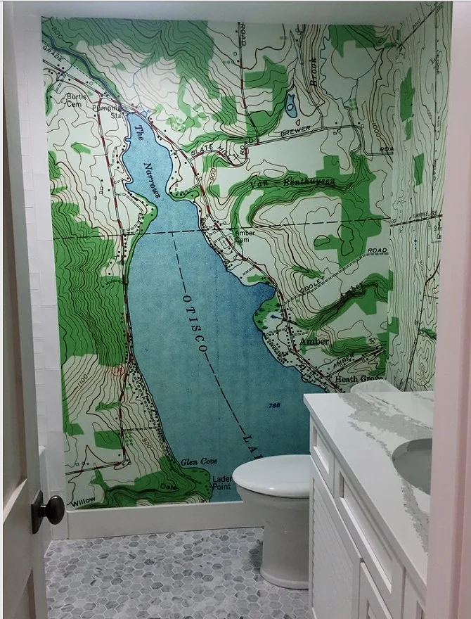 Topographical maps are gaining in popularity as wall murals. They are available with no royalty at USGS.gov. go to the “store” and it is fairly easy from there.