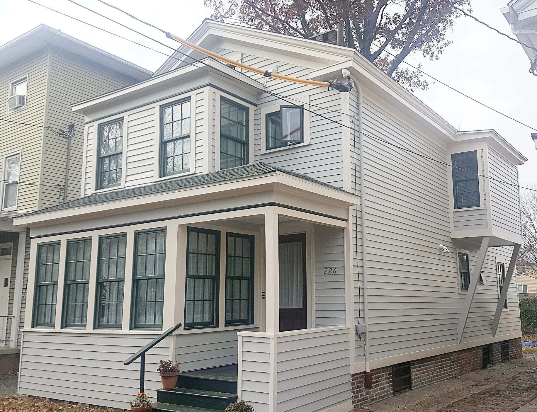 Greek revival, 1930's additions, Anderson replacement windows.